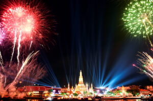 Fireworks light up the sky over Wat Arun (Temple of Dawn) during New Year celebrations in Bangkok on January 1, 2016.    / AFP / CHRISTOPHE ARCHAMBAULTCHRISTOPHE ARCHAMBAULT/AFP/Getty Images